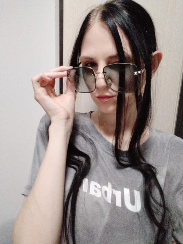 Quick selfie series, grey tee, sunglasses, pink cap.