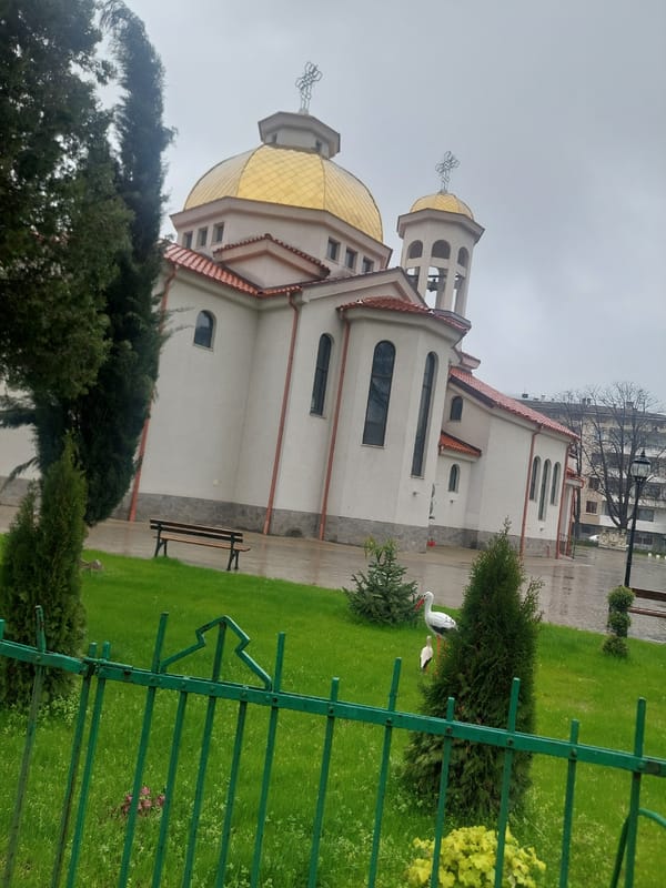 Church and wet streets documented in Asenovgrad, Bulgaria
