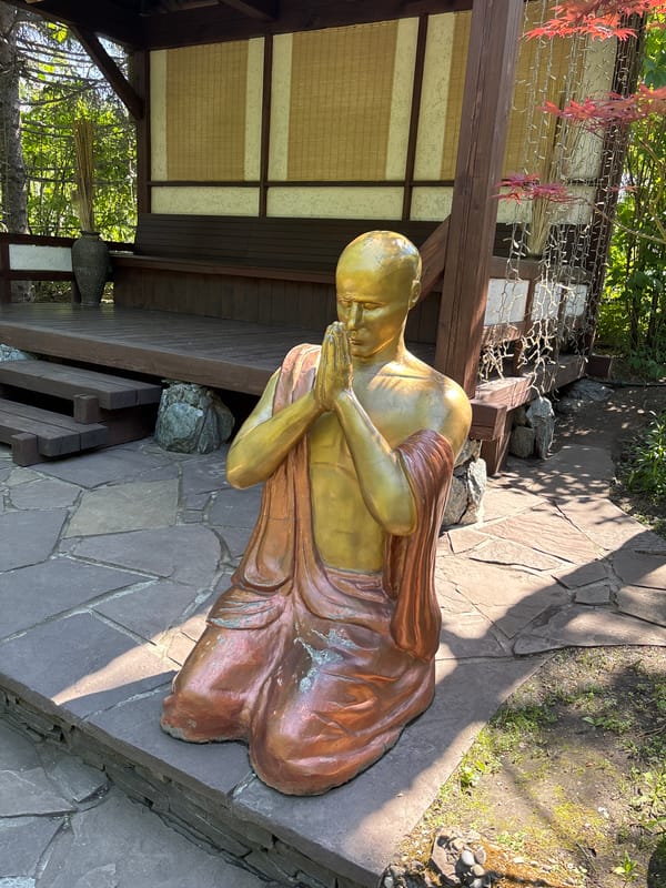 Ornamental garden with decorative statues documented in Abakan Russia