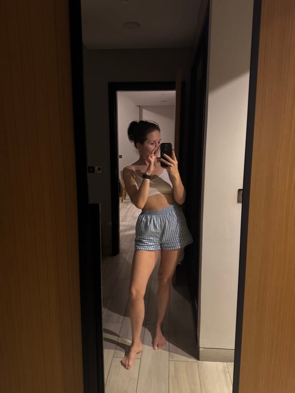 Woman takes selfie in Dubai hotel doorway