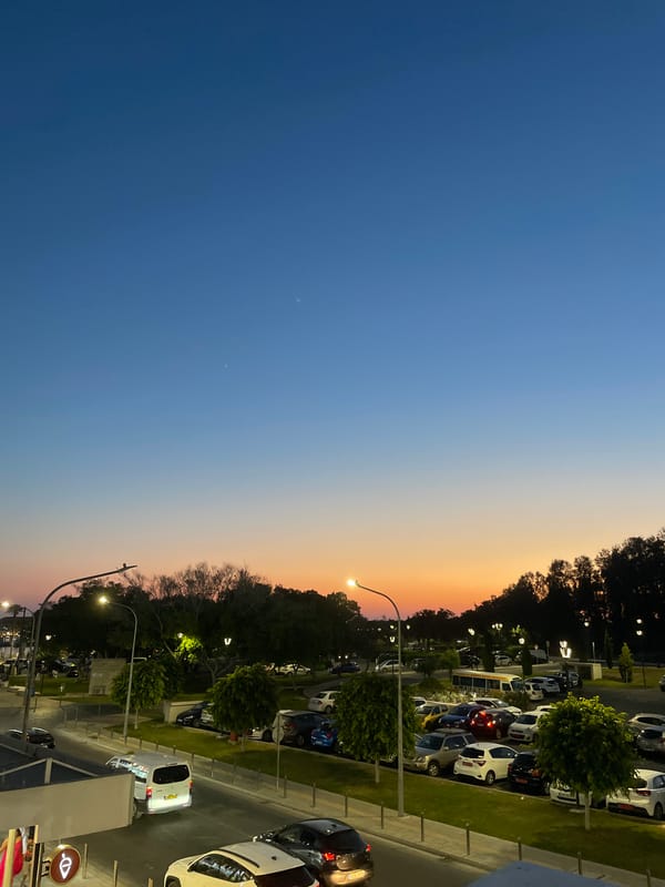 Sunset over a Paphos parking lot, golden hour in Cyprus