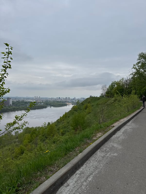 Spring morning walk documented along Nizhny Novgorod riverfront parkway