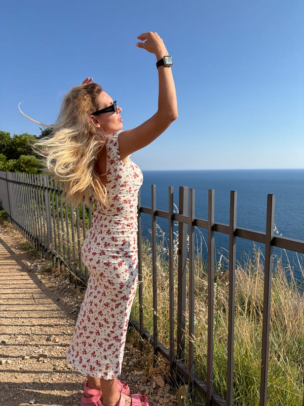 Woman explores Montenegro's Adriatic coast during afternoon sightseeing
