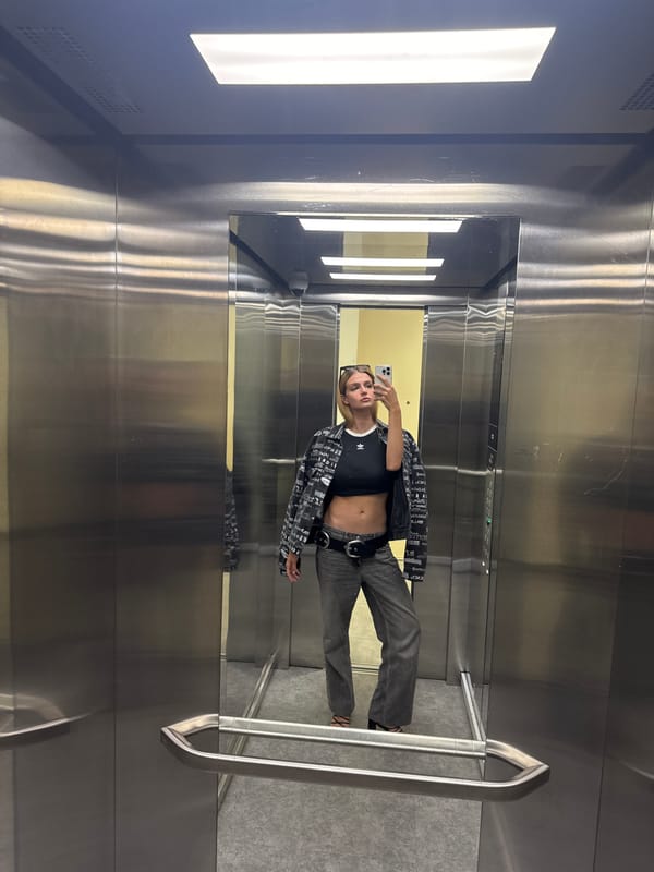 Woman documents morning routine through elevator and car selfies