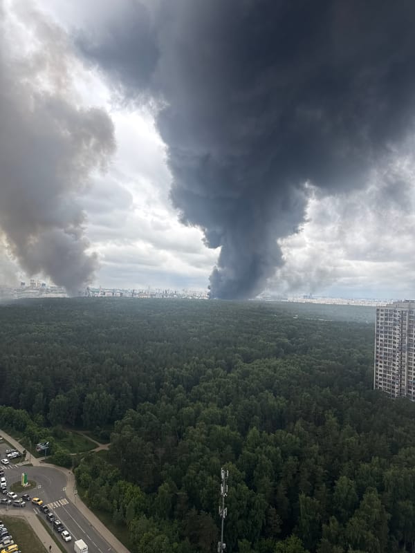Large smoke plume over Kotelniki, plus a Chihuahua on a couch