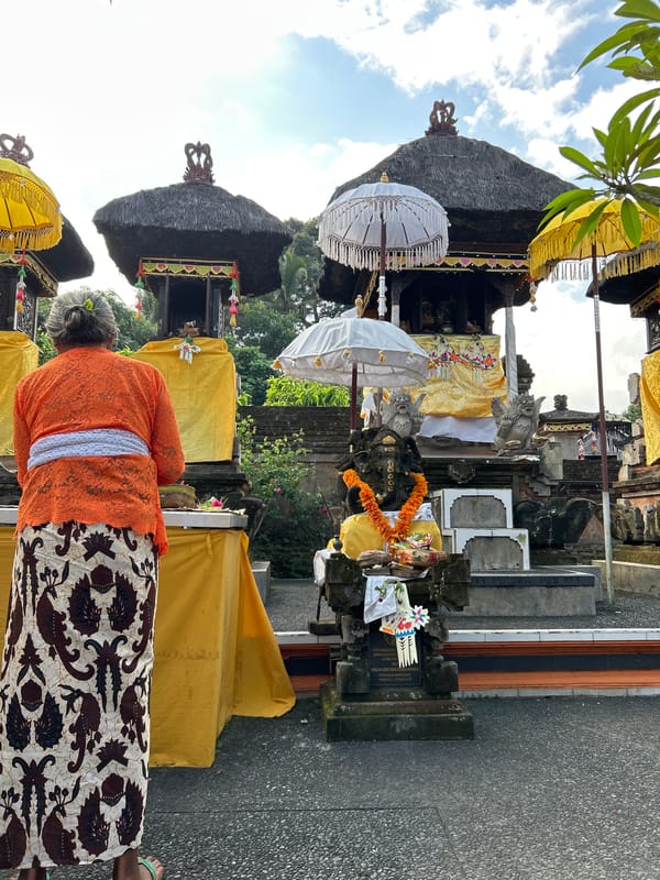 Traditional Balinese temple grounds in Abiansemal, mid-ceremony mood