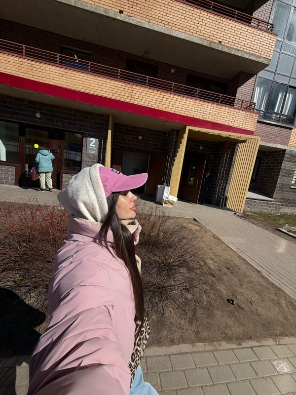 Woman in pink jacket spotted across Saint Petersburg locations