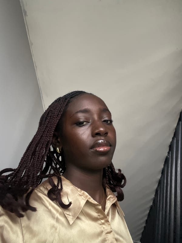 Woman films herself walking through building in Karum, Nigeria
