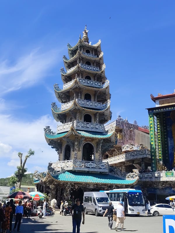 Inside and outside a mosaic-covered Vietnamese Buddhist pagoda