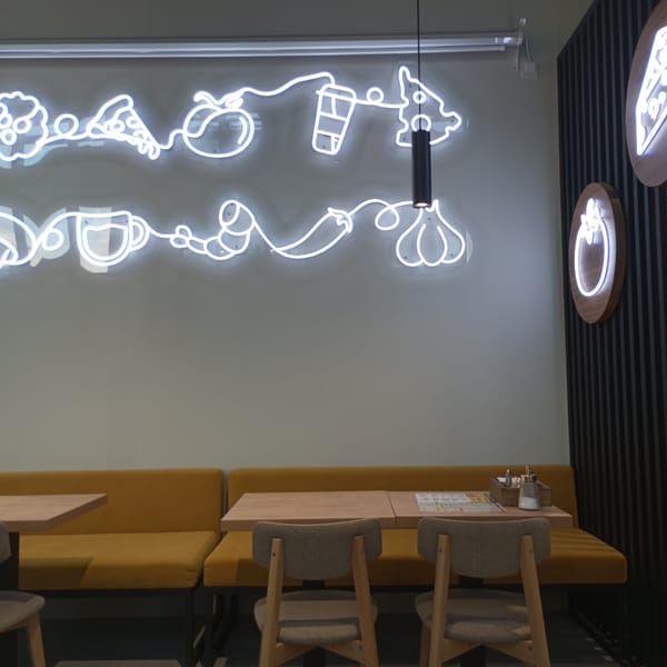 Indoor scenes captured: restaurant, woman on couch, child playing