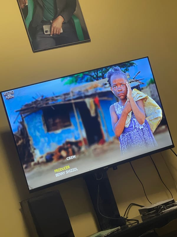 Television displays image of young girl in yellow and blue