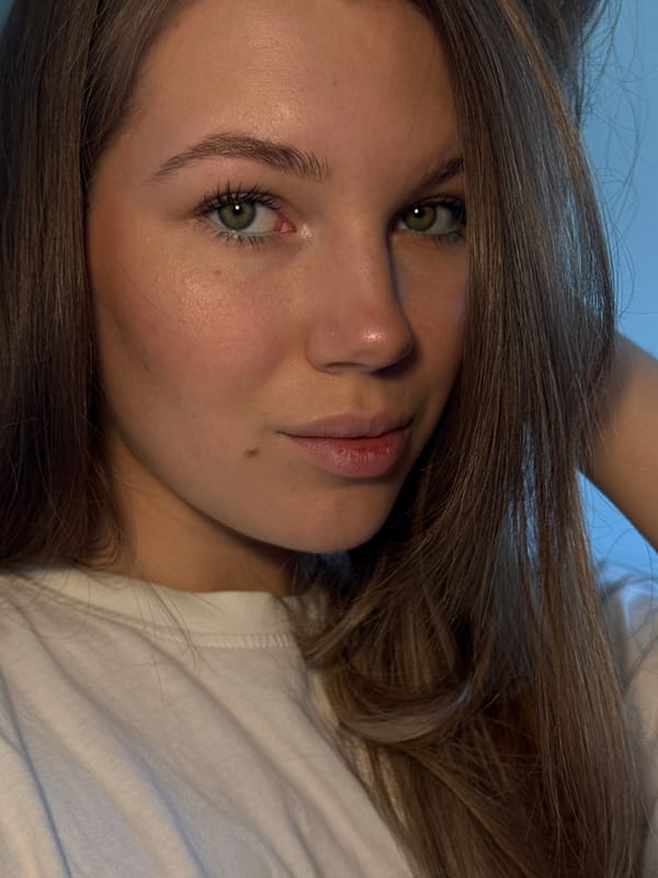 Woman applies makeup, takes selfies in Belgrade apartment