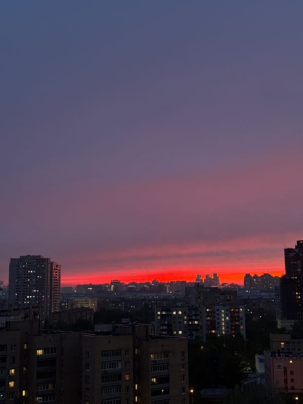 Dramatic sunset displays vivid colors over Moscow skyline