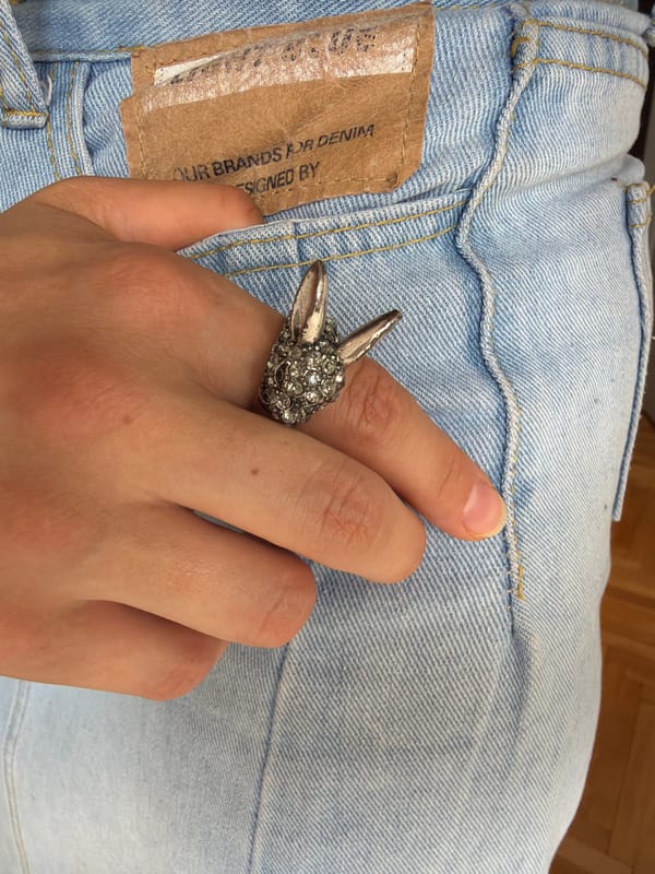 Silver rabbit-head ring with rhinestones, detailed close-up