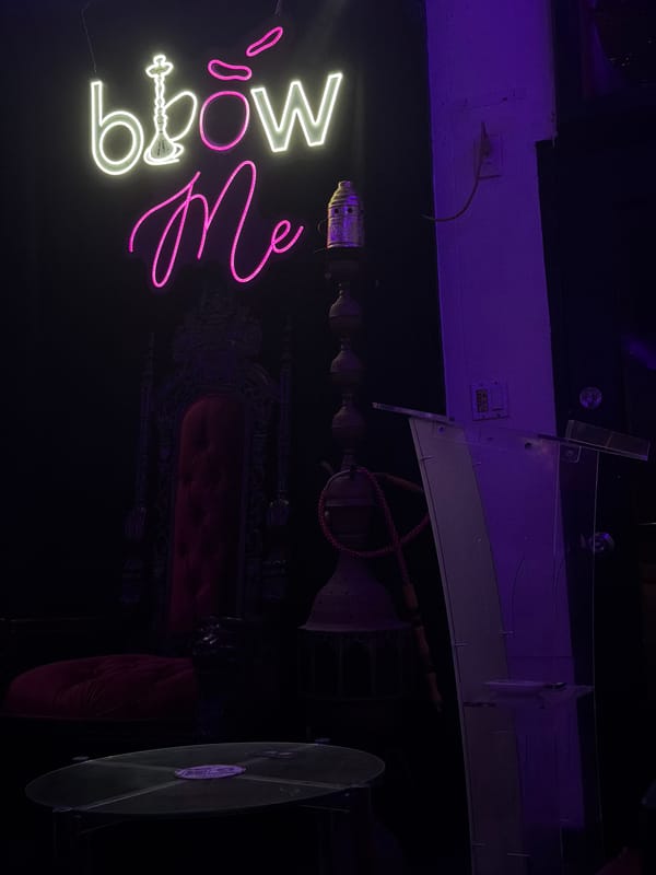 Bar interior with neon signage captured in Culver City
