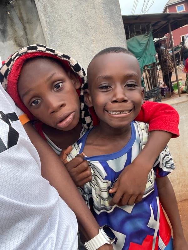 Children pose for photos in Onitsha, Nigeria
