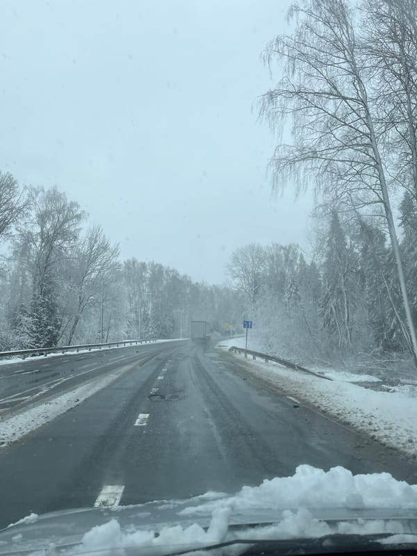 Spring snow creates slushy road conditions in Slobodka, Russia
