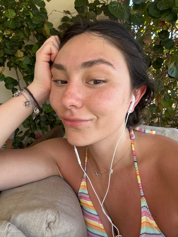Woman spending leisure time at Playa Blanca resort patio