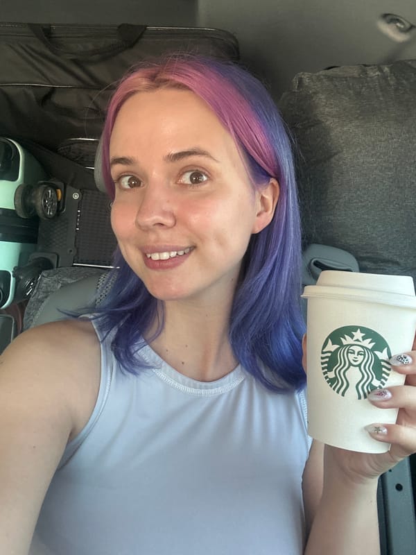 Woman enjoys Starbucks and pizza lunch in Mougins vehicle