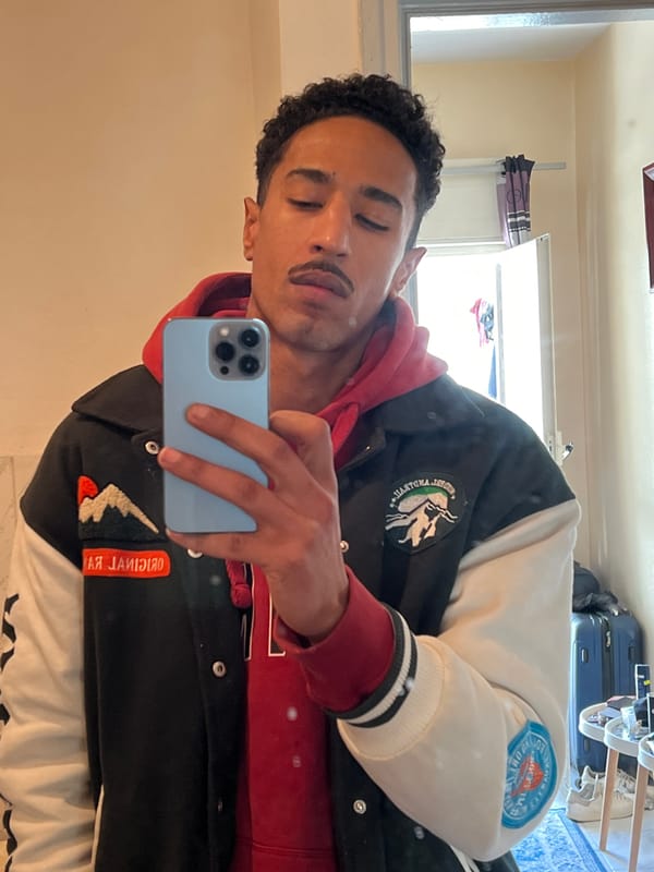 Man documents casual indoor moments through selfies in Tangier