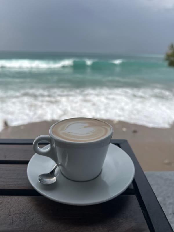 Morning coffee with latte art enjoyed at Bar beach