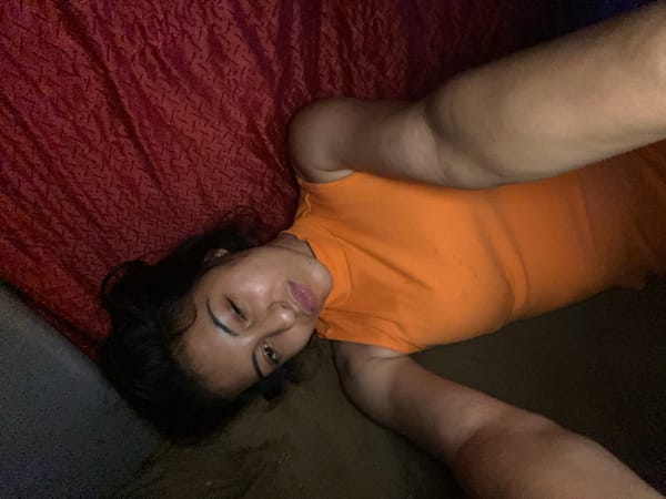 Woman resting indoors captured in evening observations