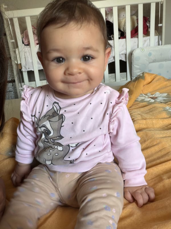 Baby portraits and caged bird photographed in Svilengrad