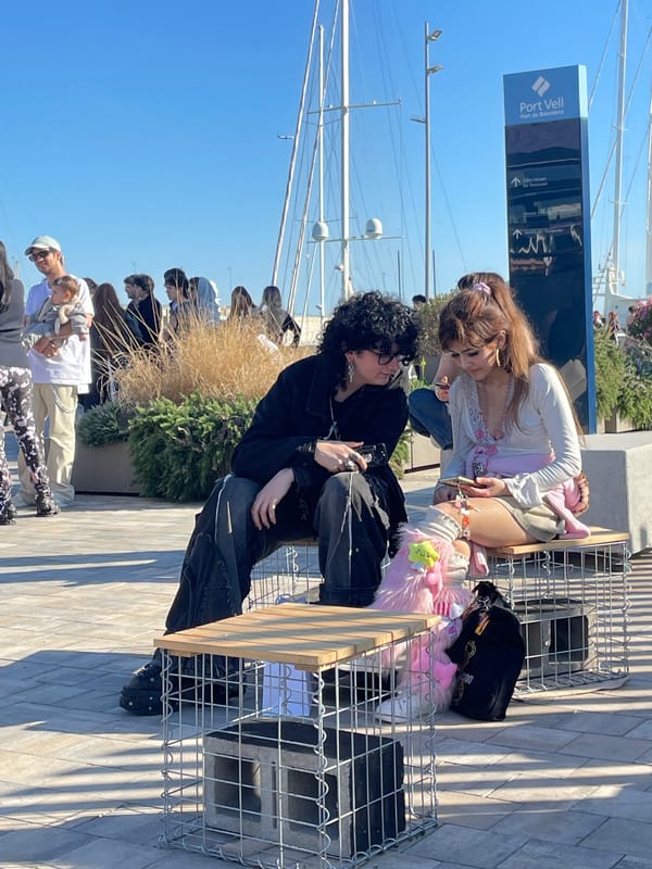 Sunny afternoon brings visitors to Barcelona's Port Vell waterfront