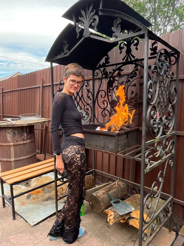 Backyard grilling session in Velyaminovo, cat included