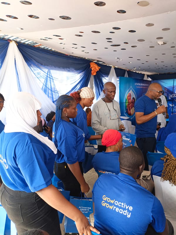Promotional event held under decorated tent in Tarauni, Nigeria