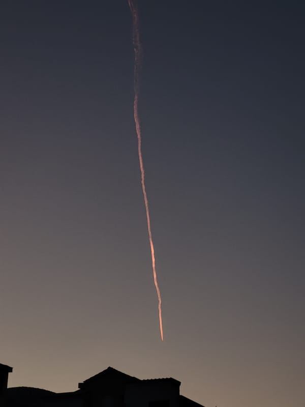 Evening meal and contrail observed in Budva, Montenegro