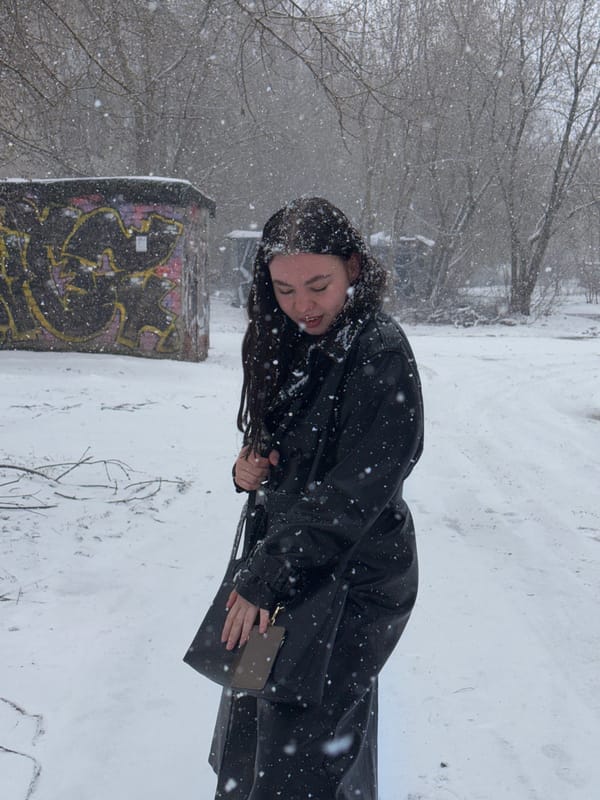 Woman photographed during heavy snowfall in Perm, Russia