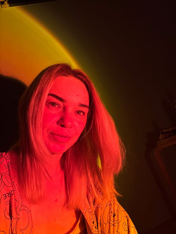 Cozy night in: cats, candy, and warm mood lighting