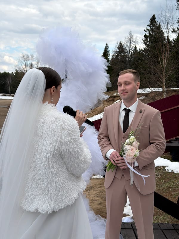 Outdoor winter wedding ceremony held in Chaikovsky, Russia