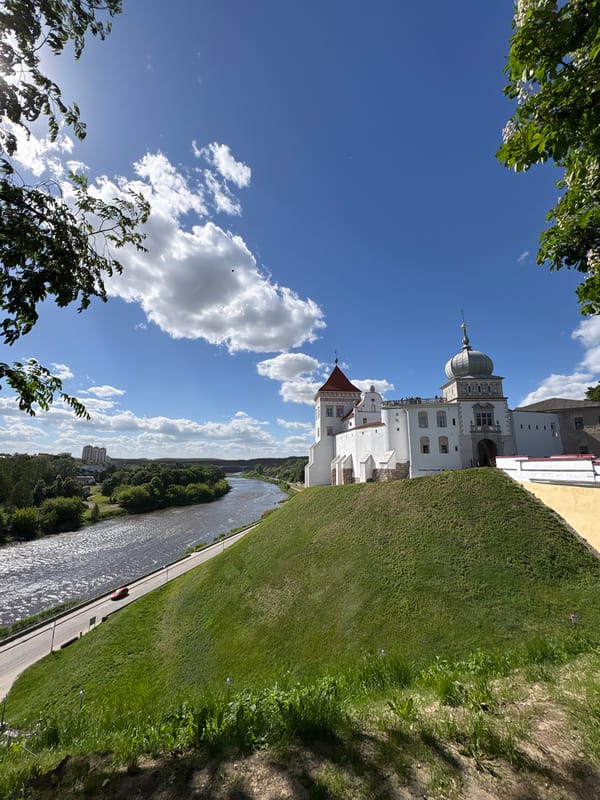 Tourists document sunny day sightseeing in historic Hrodna, Belarus