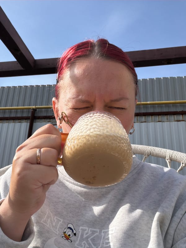 Woman enjoys morning meal in Chaikovsky, Russia