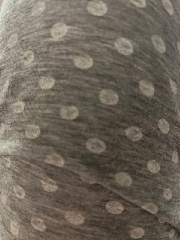 Gray polka-dot fabric observed with white dot pattern