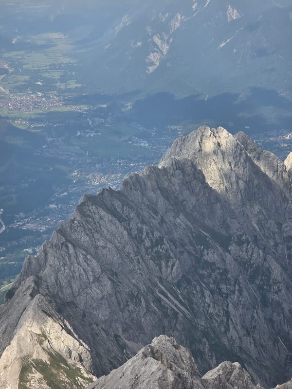 Cable car ride above Eibsee with Zugspitze alpine views
