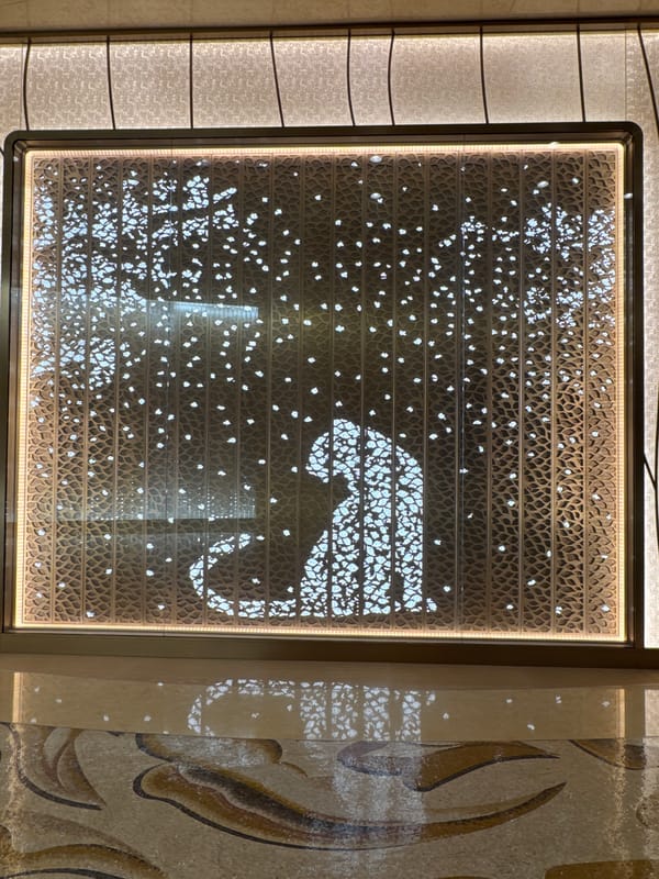 Illuminated elephant motif panel observed in Macao interior