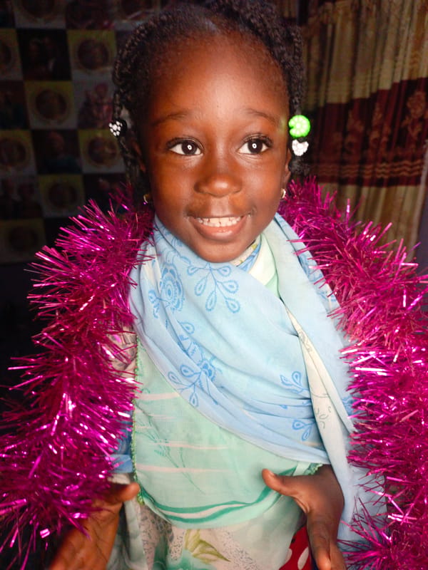 Father and daughter share playful moments at home in Akwanga