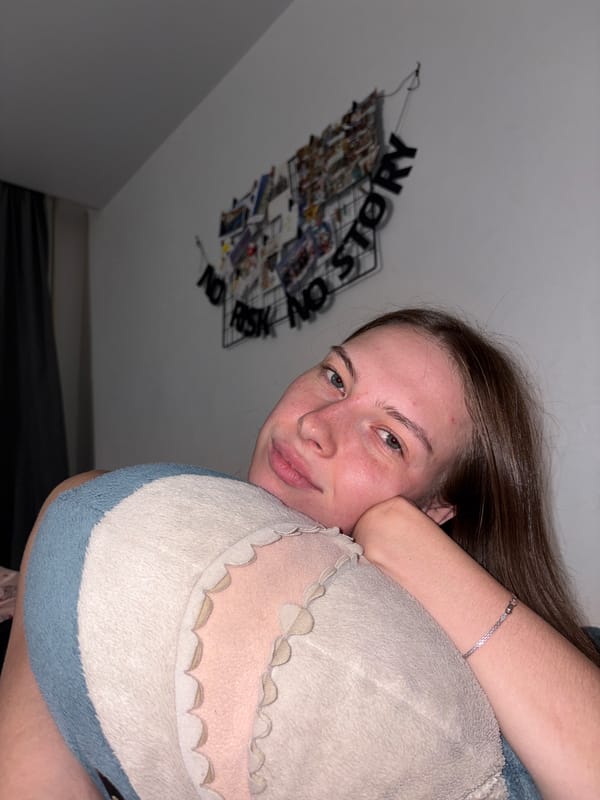 Bedroom selfie session with a plush shark in Perm