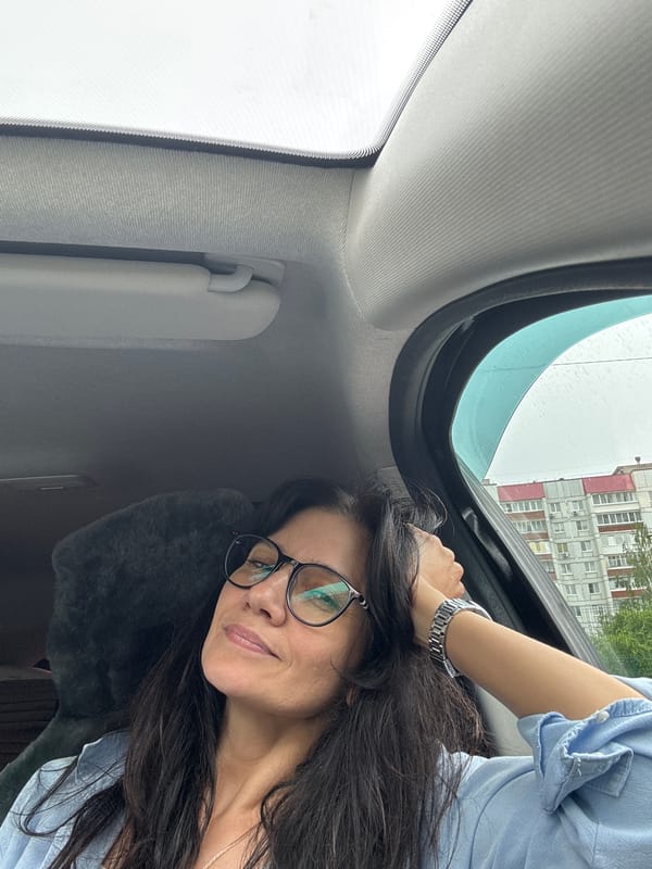 Relaxed moment inside a car with sunroof open, Chaikovsky