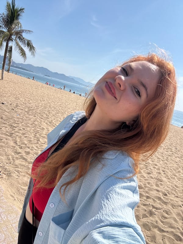 Sunny afternoon along Nha Trang's palm-lined beachfront