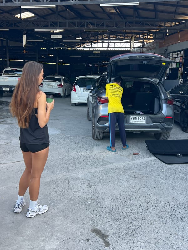 Woman visits auto service facility in Thailand early morning