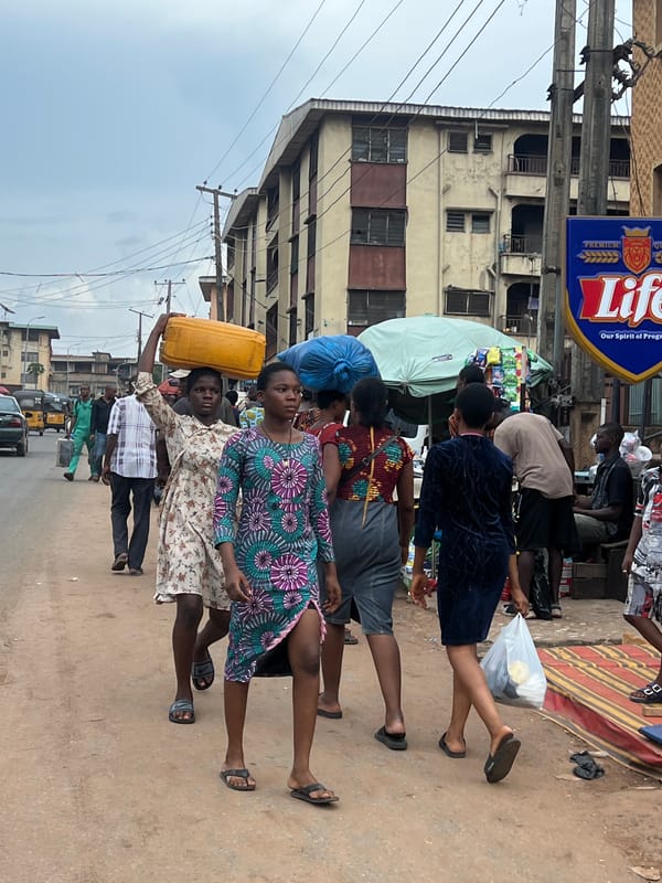 Afternoon street life in Nkpor's busy commercial district