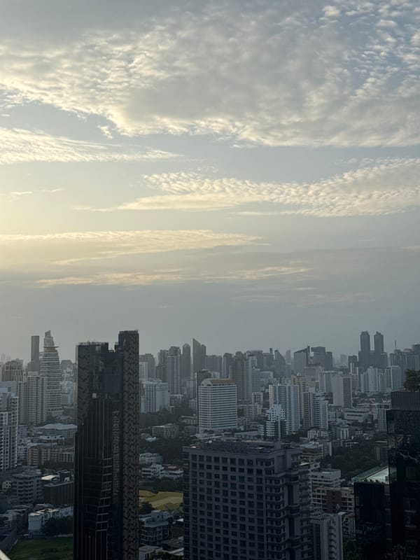 Rooftop afternoon in Bangkok with skyline and sky views