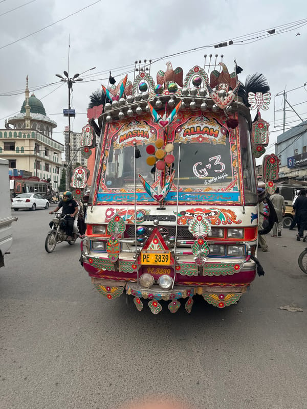 Ornate bus and street life in Karachi