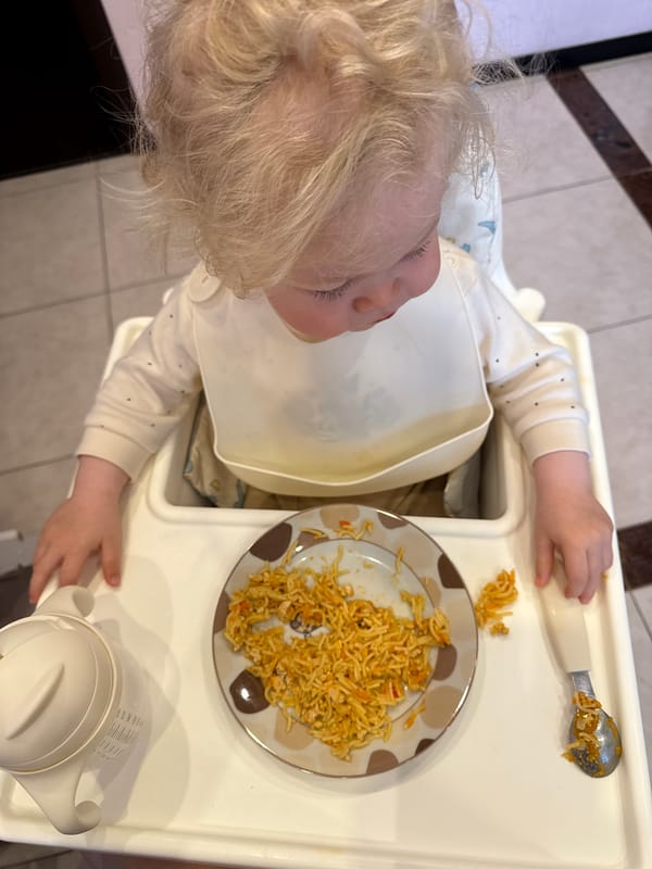 Child feeding time captured in Vladimir family moment