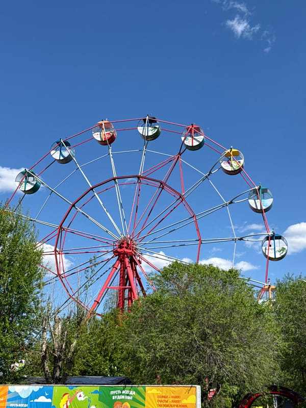 Ferris wheel spotted under blue skies in Krasnoyarsk park
