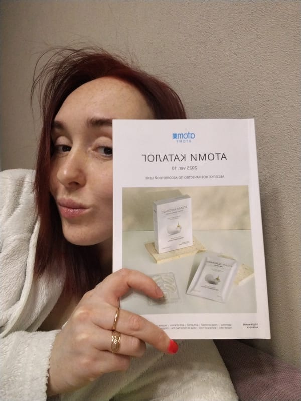 Woman takes selfies in white robe in Izhevsk